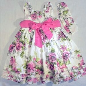 SAVANNAH Floral dress with pink belt. Size 2T.